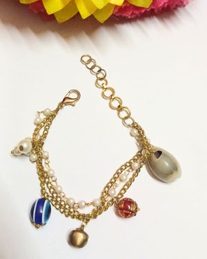 golden layered charm bracelet