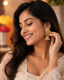 Golden pearl earrings